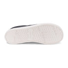 Xero Shoes Glenn Barfußschuhe für Herren in Schwarz und Weiß aus Leder, aus der Unteransicht, zeigen die flexible und griffige Sohle, die für optimalen Halt und Komfort sorgt. Diese Schuhe bieten alles, was Sie für einen natürlichen Gang benötigen. Erhältlich in unserem Onlineshop für Barfußschuhe.